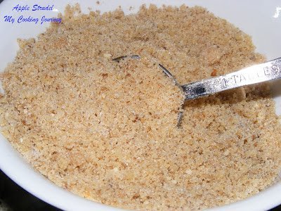 Combine ingredients in a bowl with spoon.