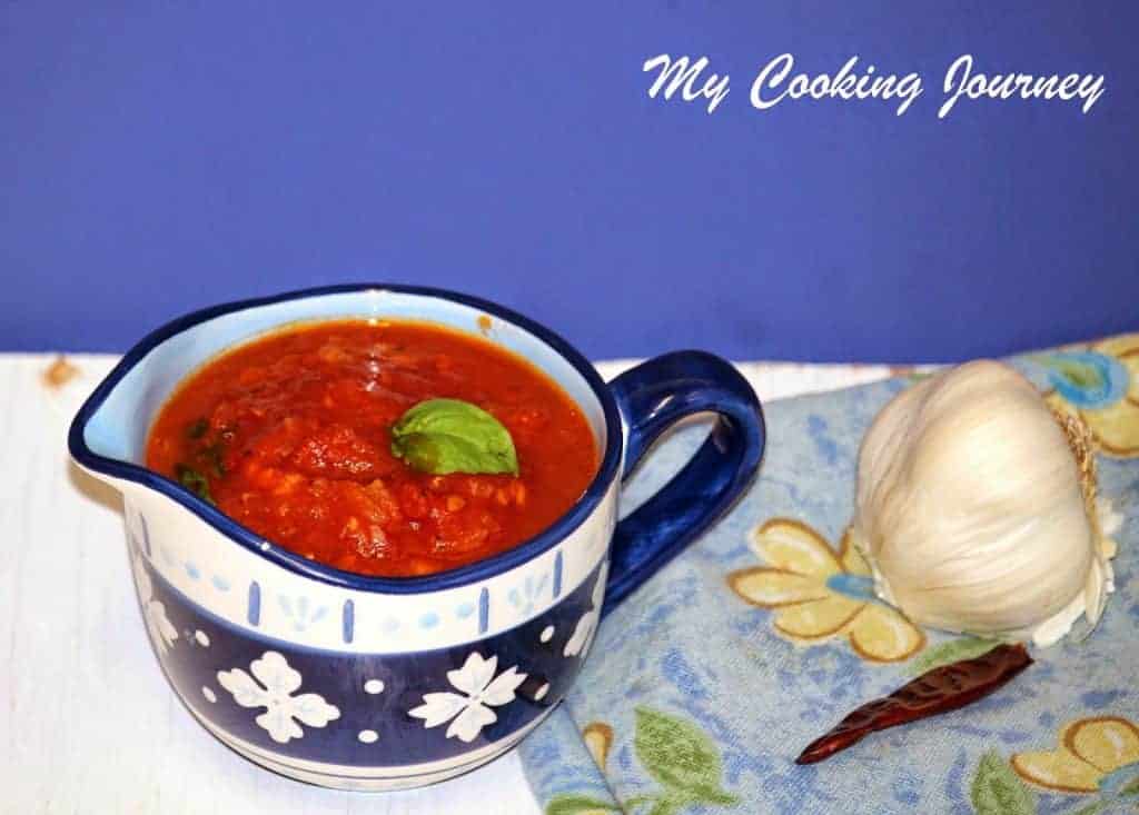 Penne All ‘Arrabbiata in a cup garnish with cilantro