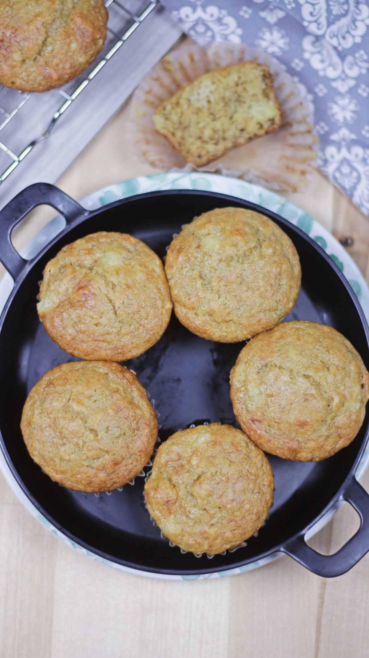 5 banana pineapple muffins in a black plate