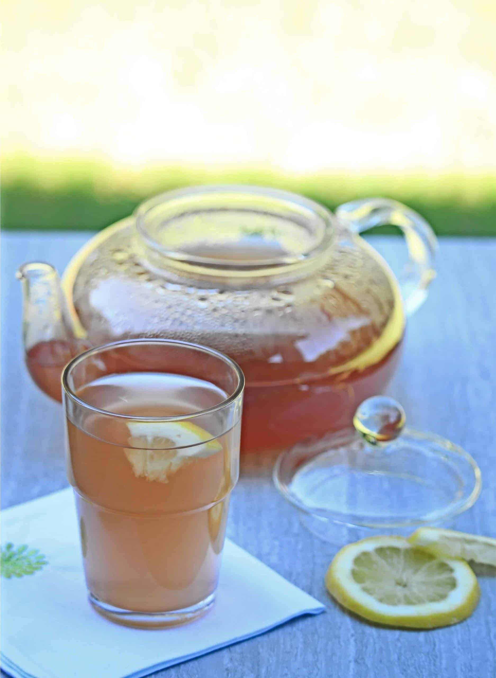 Bori-Cha in glass cup with tea pot in background