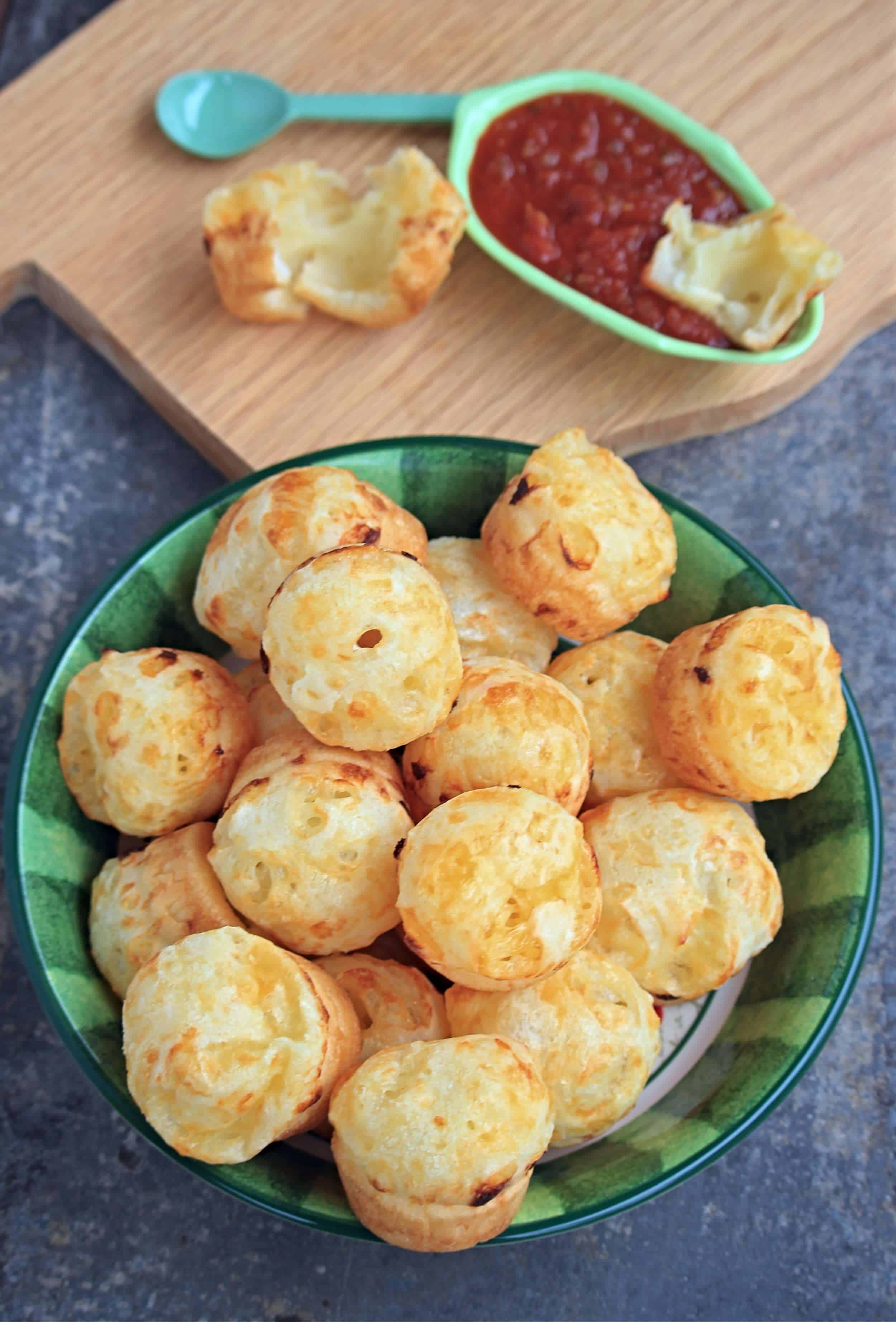 puffed up Pão de Queijo in a bowl