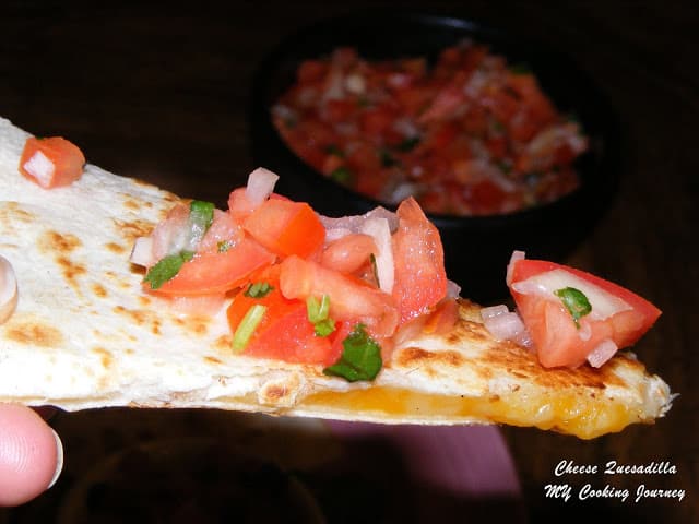 Serve Cheese Quesadilla with salsa