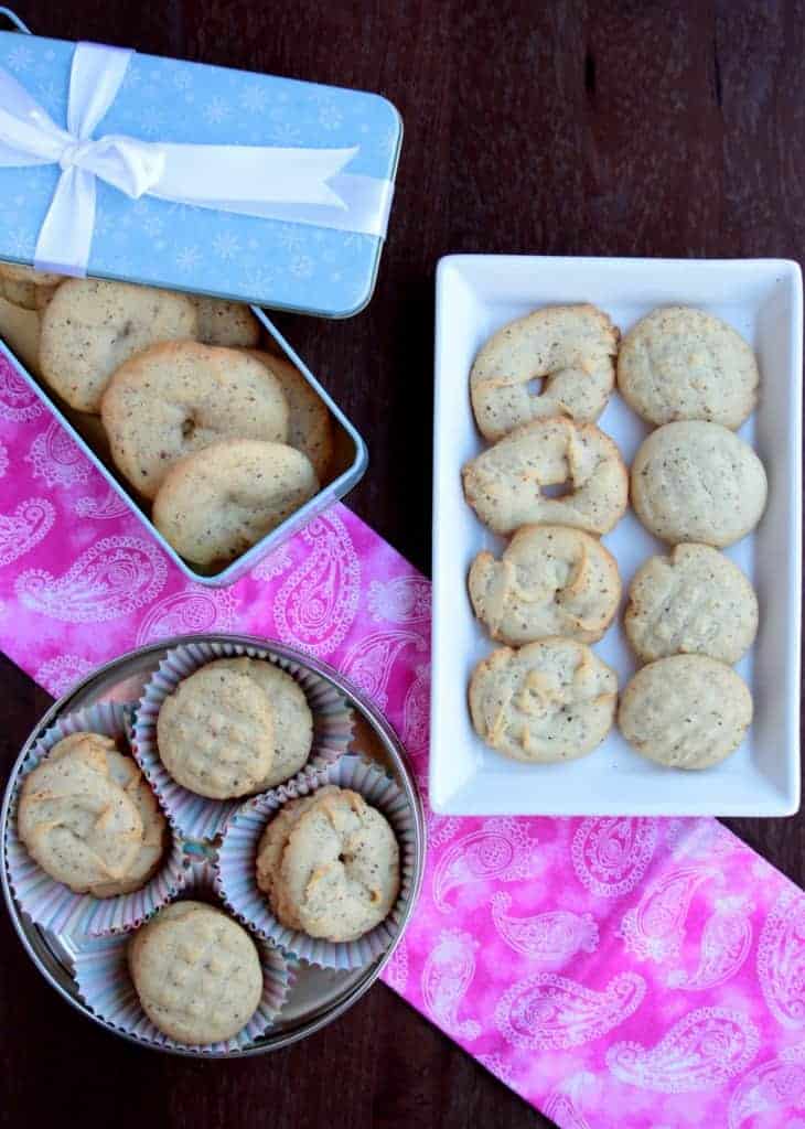 cookies arranged in tin and white plate