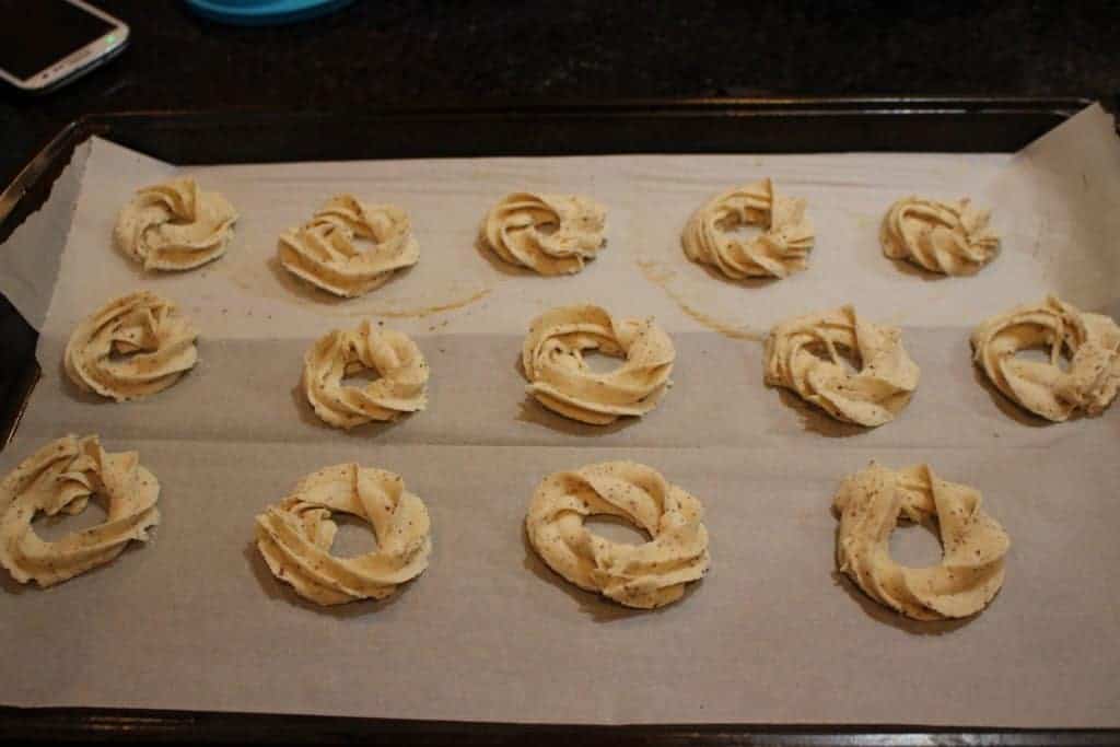 Piped cookie dough on a baking tray