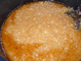 mashed rice in jaggery syrup