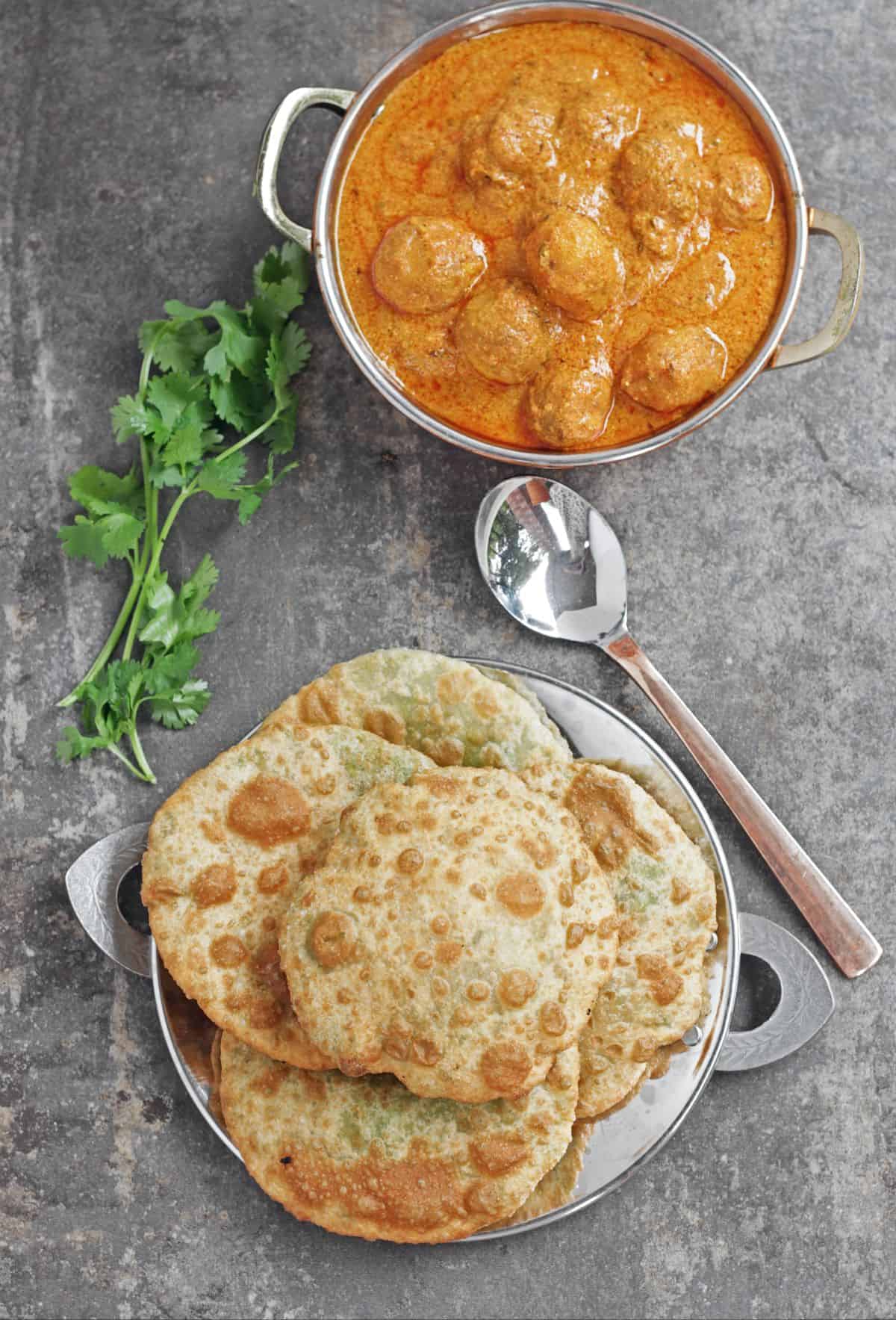 Green peas kachori served with spicy dum aloo