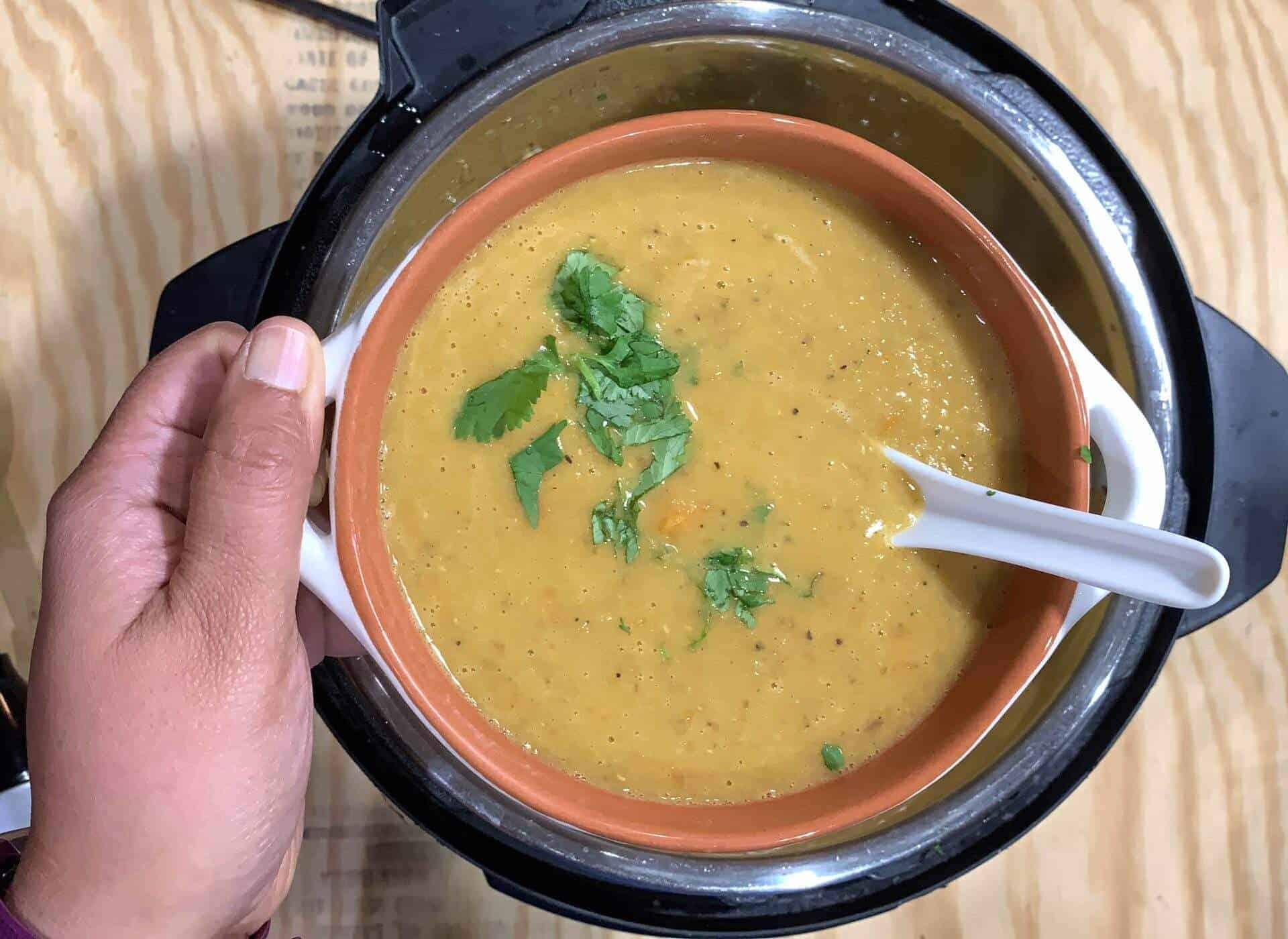 lentil soup scooped in a bowl