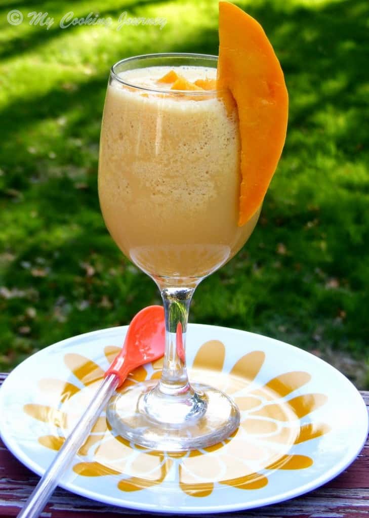 Mango Julius in a tall glass cup 