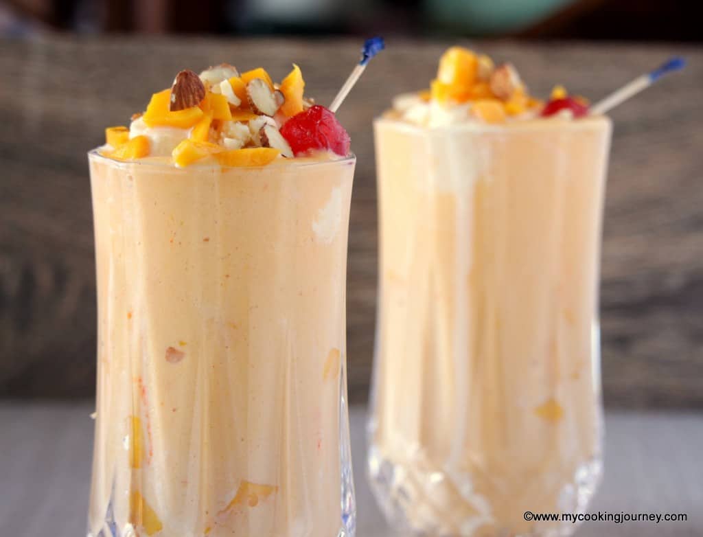 Mango Mastani in two tall glass cups