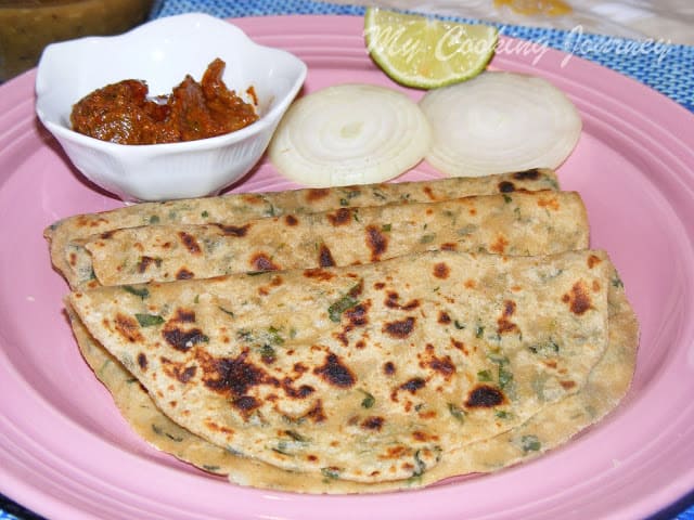 Aloo Methi Paratha with onions and lemons