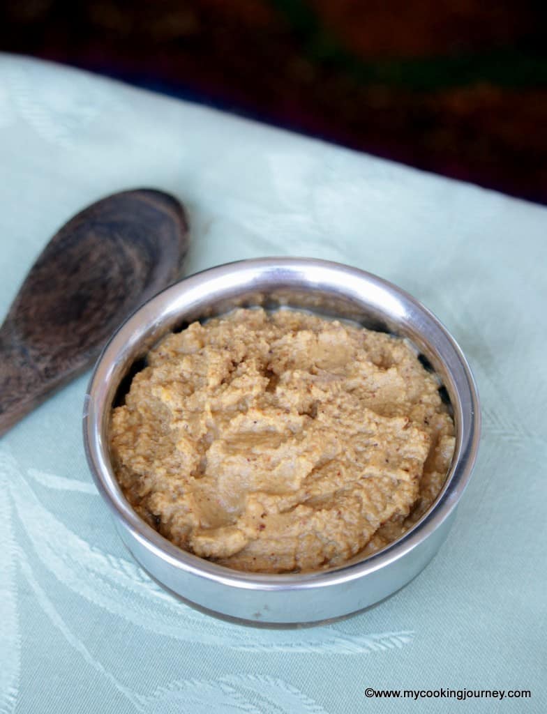 Paruppu Thuvayal served in a bowl with spatula