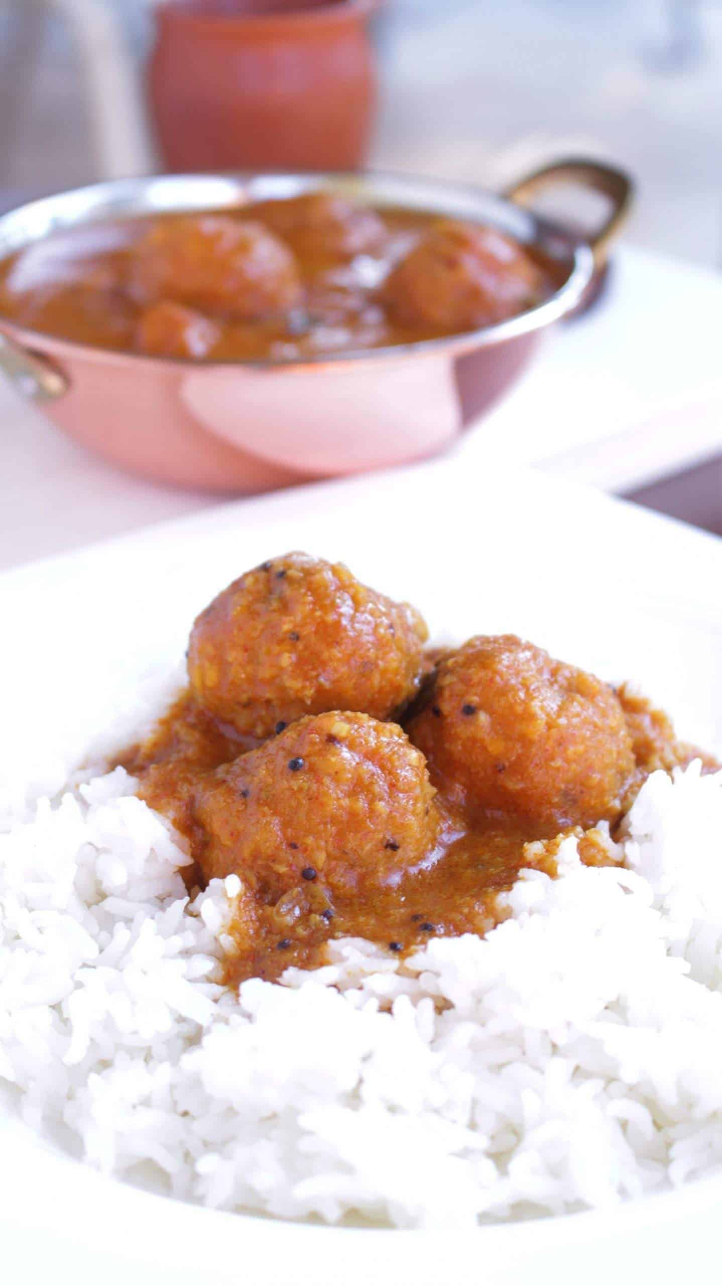 Chettinad Paruppu Urundai Kuzhambu on rice.