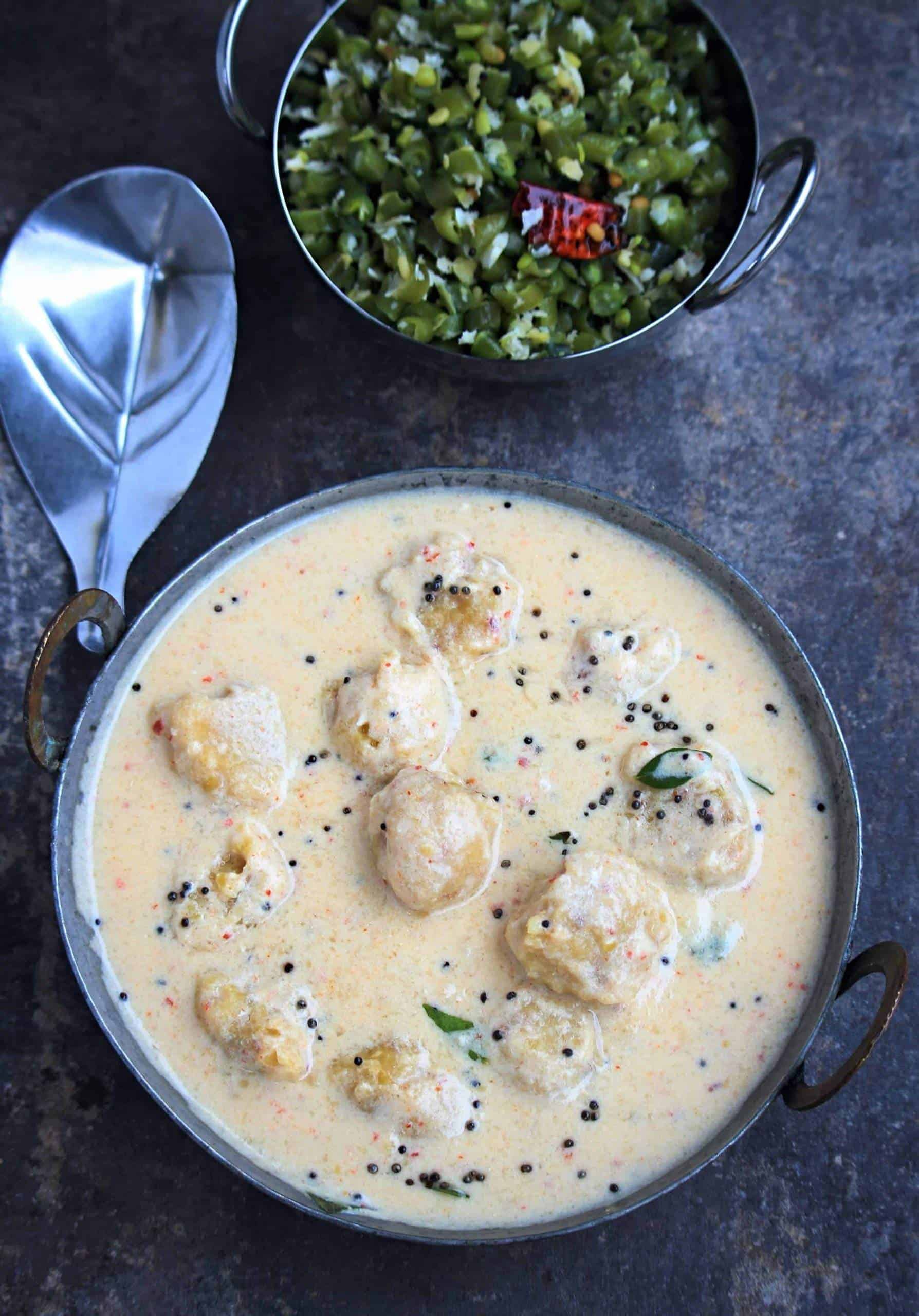 Paruppu Urundai mor kuzhambu with beans curry in the side