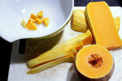 Cutting squash and adding in a bowl