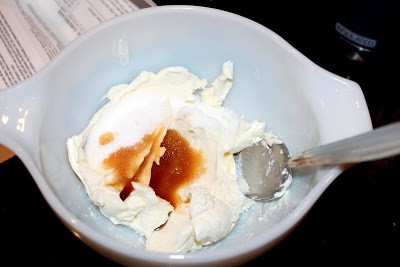 Cream cheese in a bowl with spoon